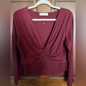 Burgundy knit top, deep v-neck, with touching